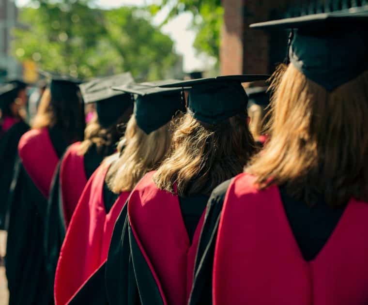 a group of people wearing graduation gowns